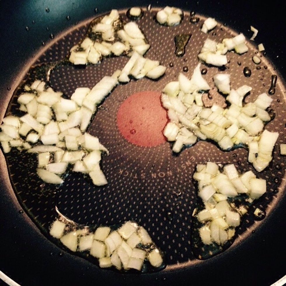 Chop the remaining onion and put it in a pan with some olive oil and water
