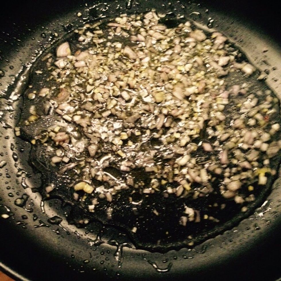Chop the shallot and add it to a pan with some olive oil and water