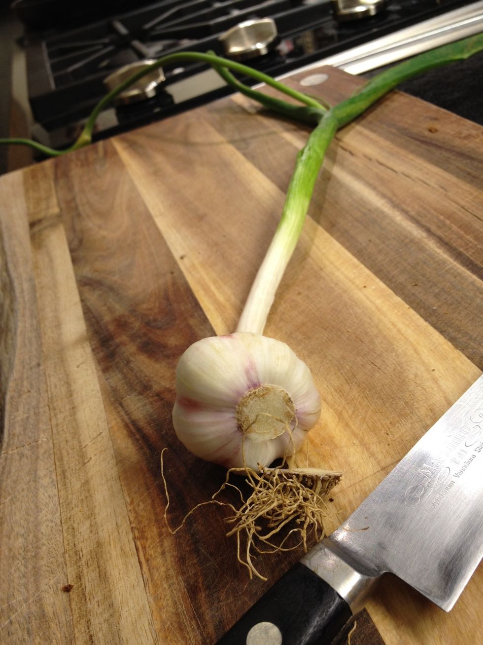 Chop the sides of the garlic
