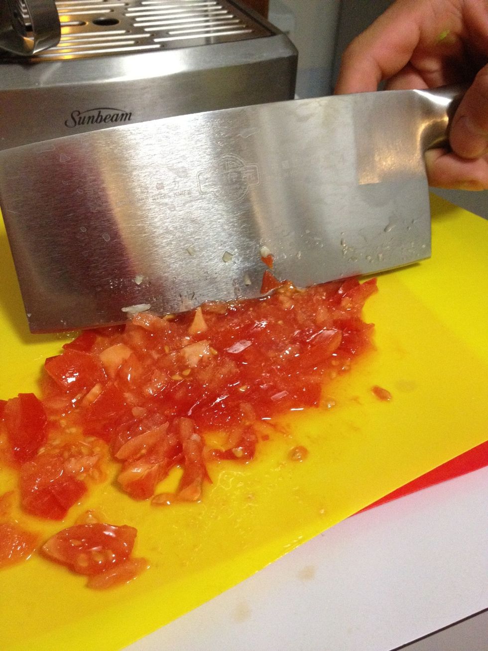 Chop the tomato.