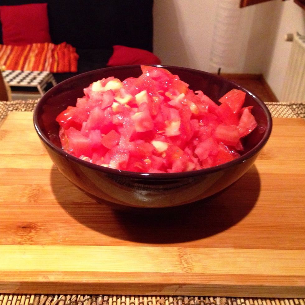 Chop the tomatoes into small cubes.