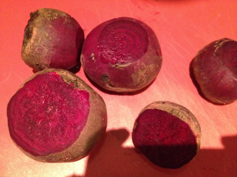 Chop the tops and ends off the beetroot and peel the skin