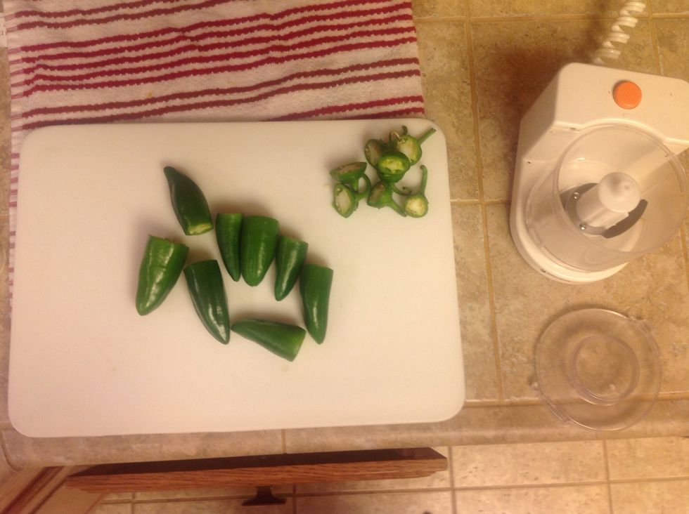 Chop the tops off your jalepenos and place them in your food processor.
