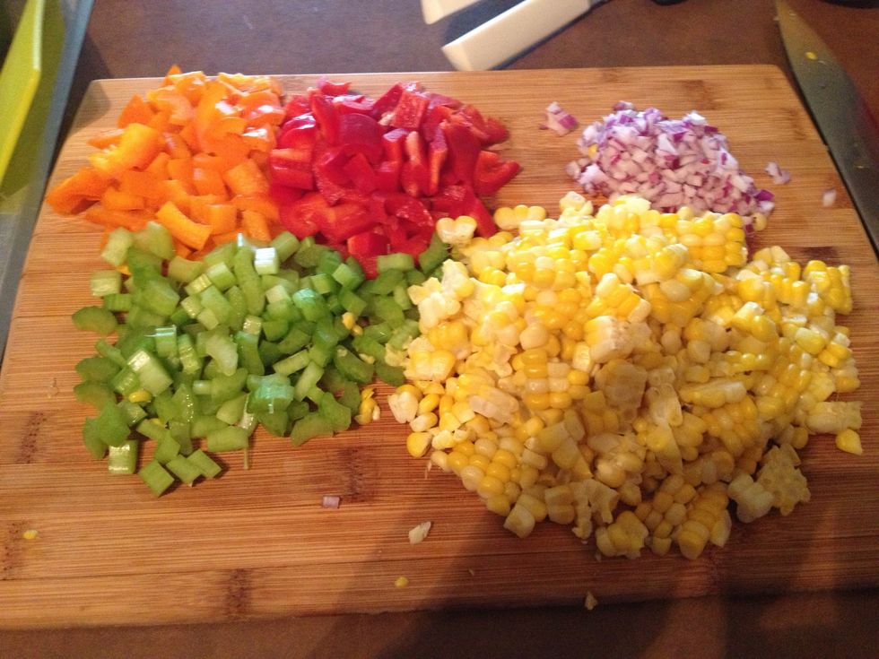 Chop the vegetables (celery, corn, onions and bell peppers) into bite size pieces. I used corn on the cob (cooked in boiling water) and then just shaved it off. You could use canned corn as well