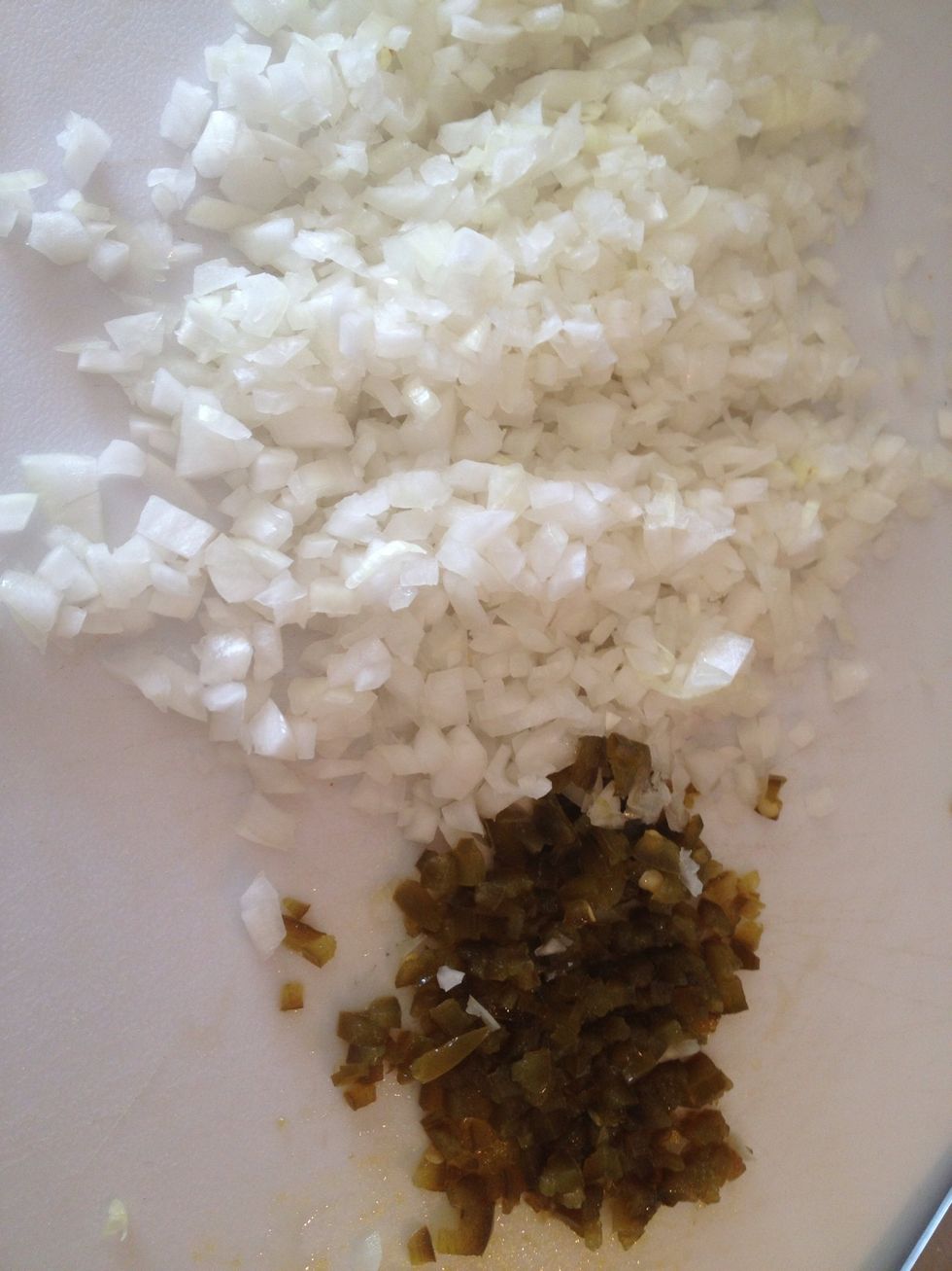 Chop the whole onion and the jalape\u00f1o.