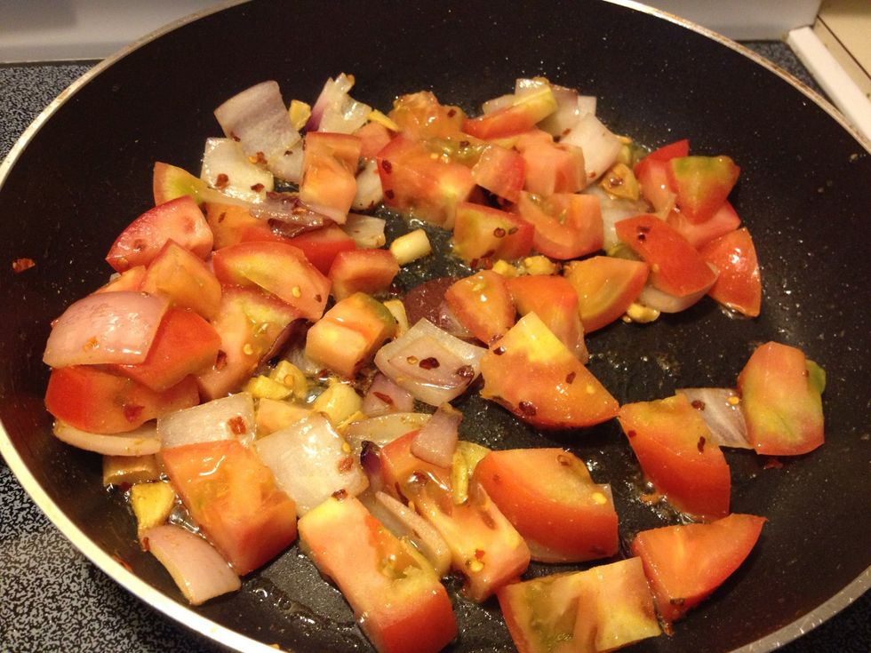 Chop tomato and add to the onions