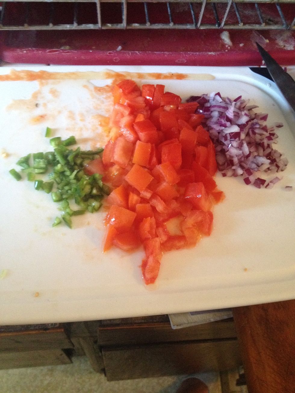 Chop tomatoes and finely dice the onion and jalape\u00f1o