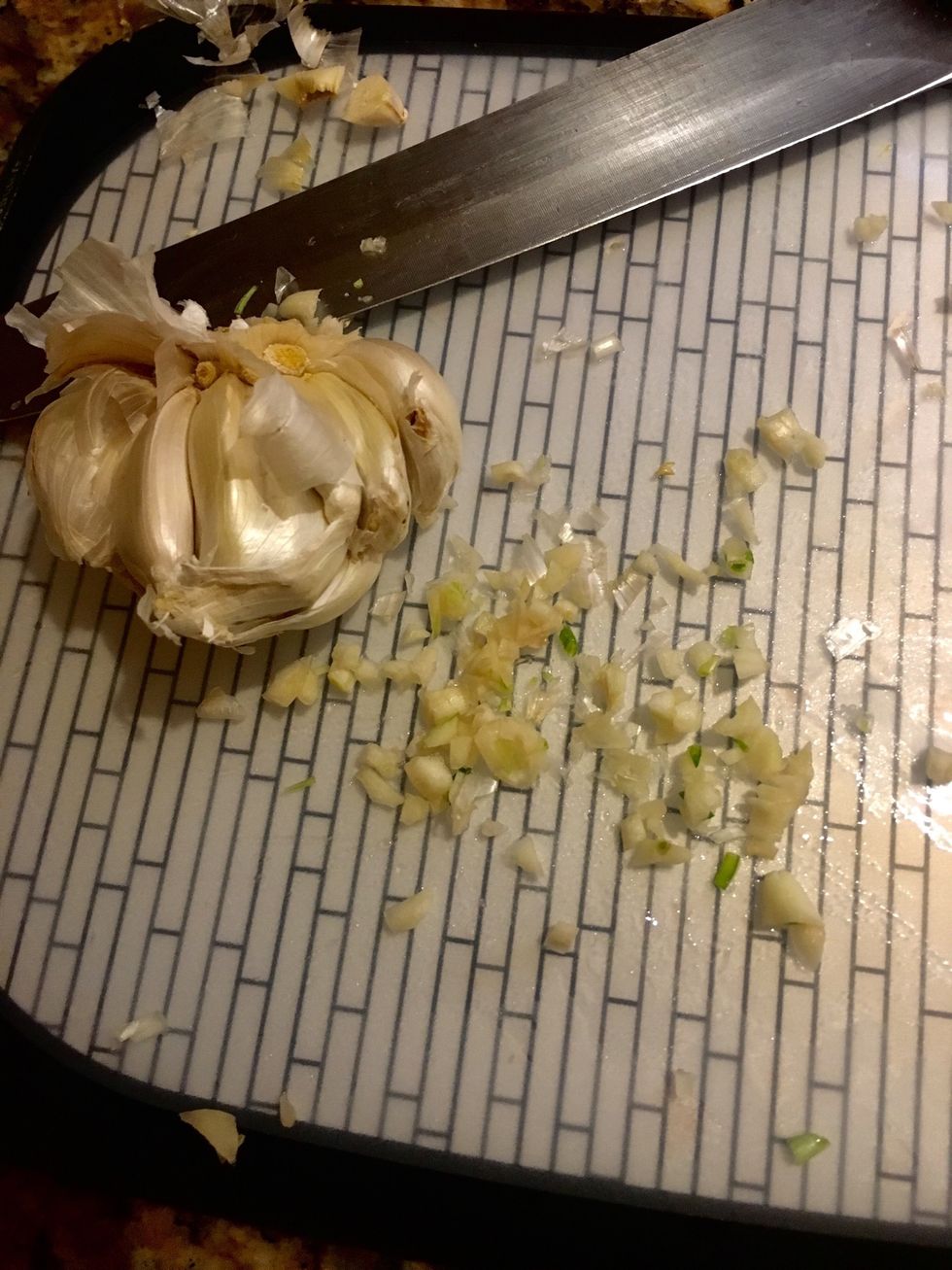 Chop two cloves of garlic (finely)