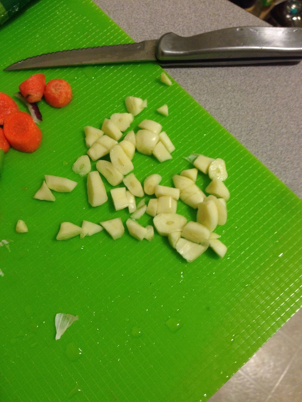 Chop up 5 cloves of garlic.