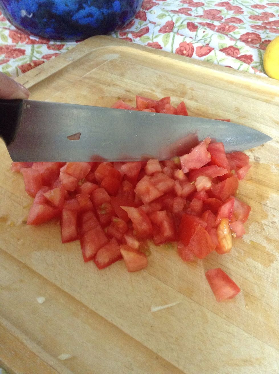 Chop up a couple tomatoes. . .