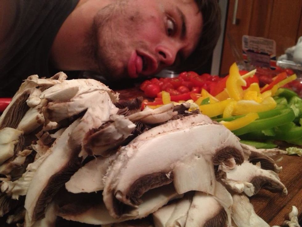 Chop up all the vegetables while the pork is cooking, stupid faces are optional.