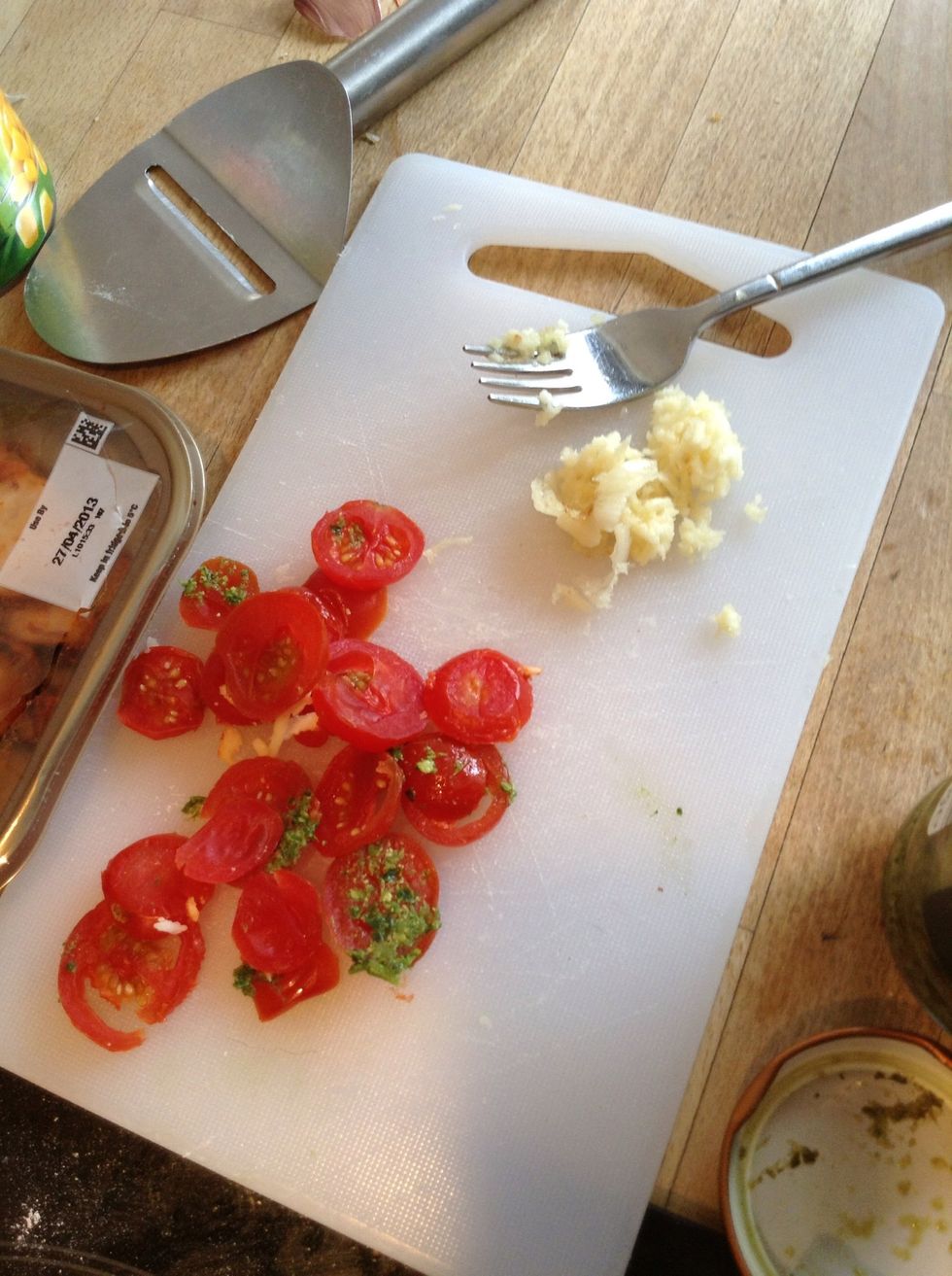 Chop up garlic, I put a big of garlic through the crusher to make it quick and to be honest I'm crap at chopping garlic! Chop up baby tomatoes!
