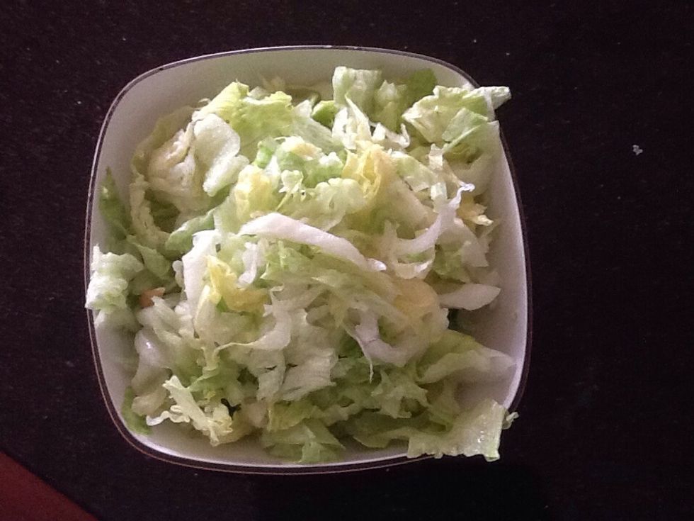 Chop up lettuce and place into another bowl, make sure it is washed and clean.