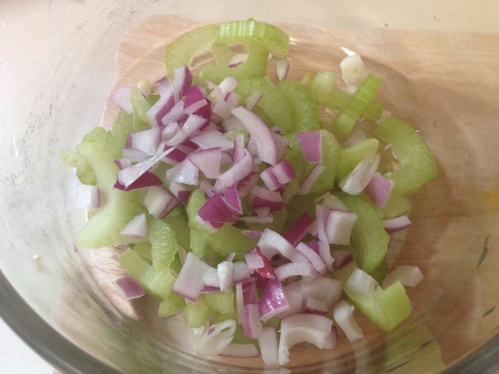 Chop up pieces of celery and red onion