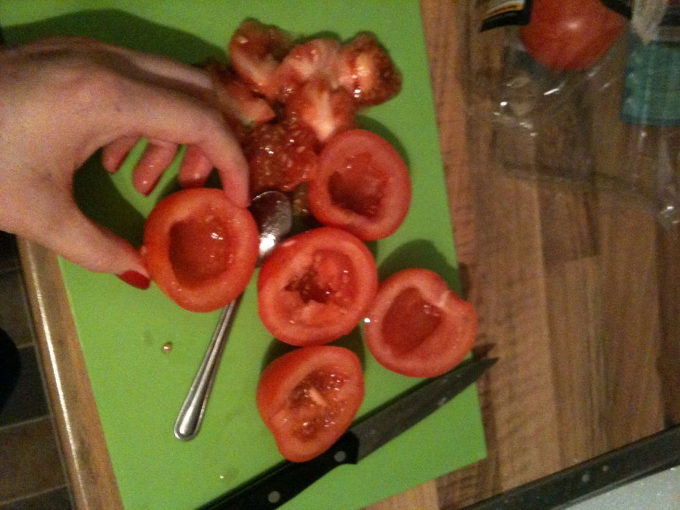 Chop up some tomatoes into halves and if like me you don't like the seeds scoop them out! :P