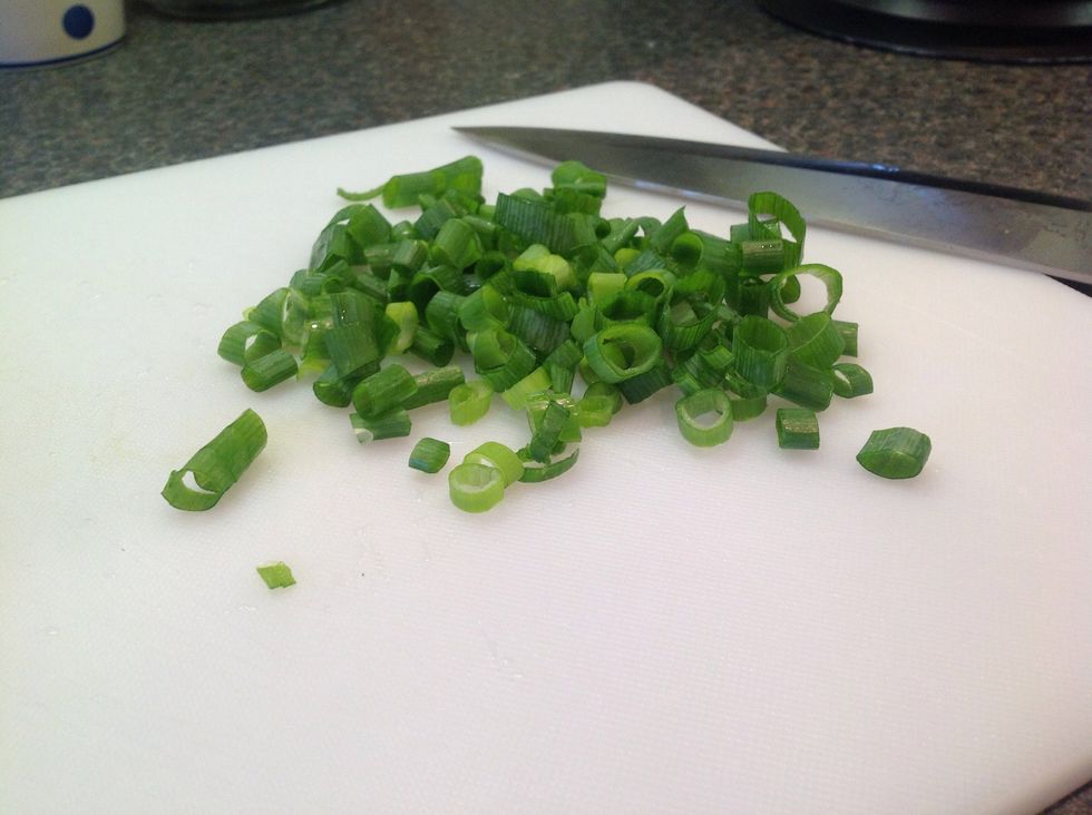 Chop up the dark green part of the green onions (spring onions in UK English).