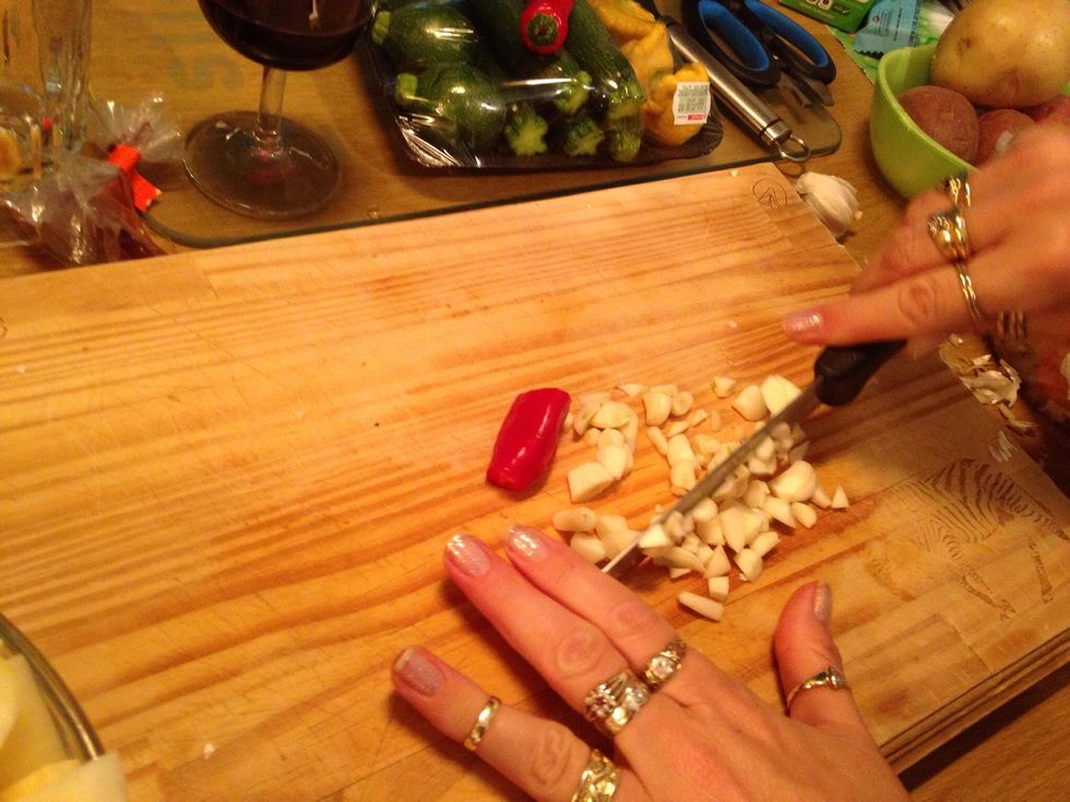 Chop up the garlic into small pieces ( we added some chili ... Optional)