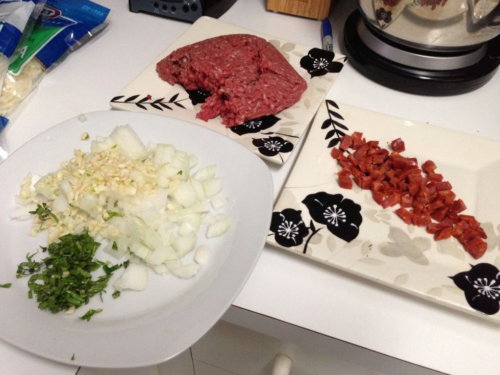Chop up the onions, garlic, culantro and chorizo