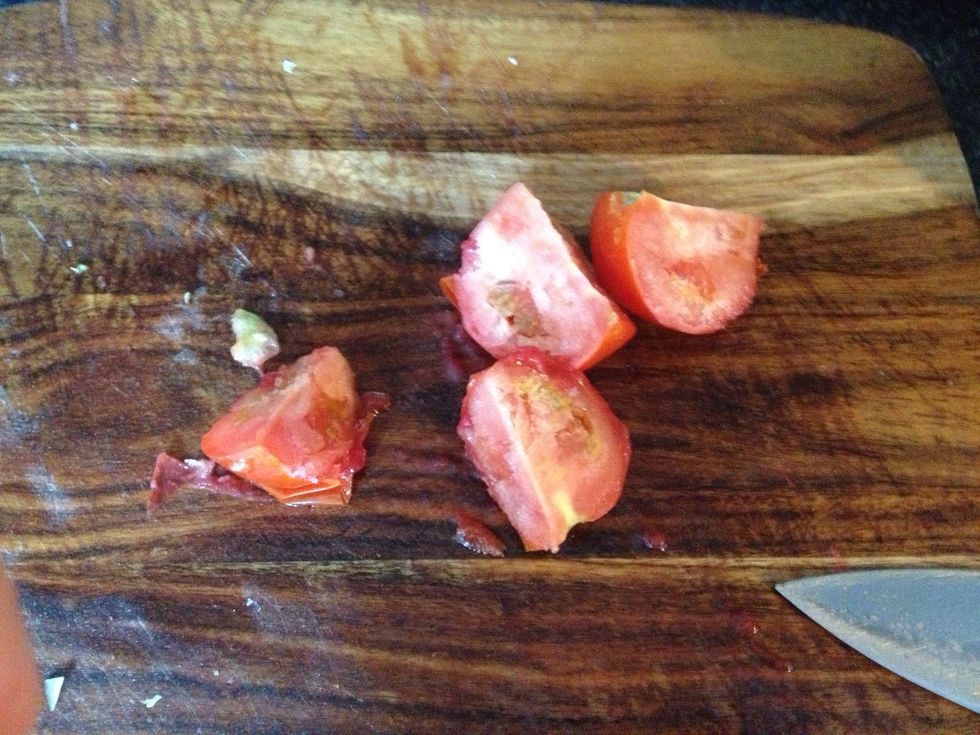 Chop up tomatoes. Use fresh or frozen. I always buy extra tomatoes and freeze what I don't use so that I have it handy for cooking (just add boiling water to thaw so you can chop them).