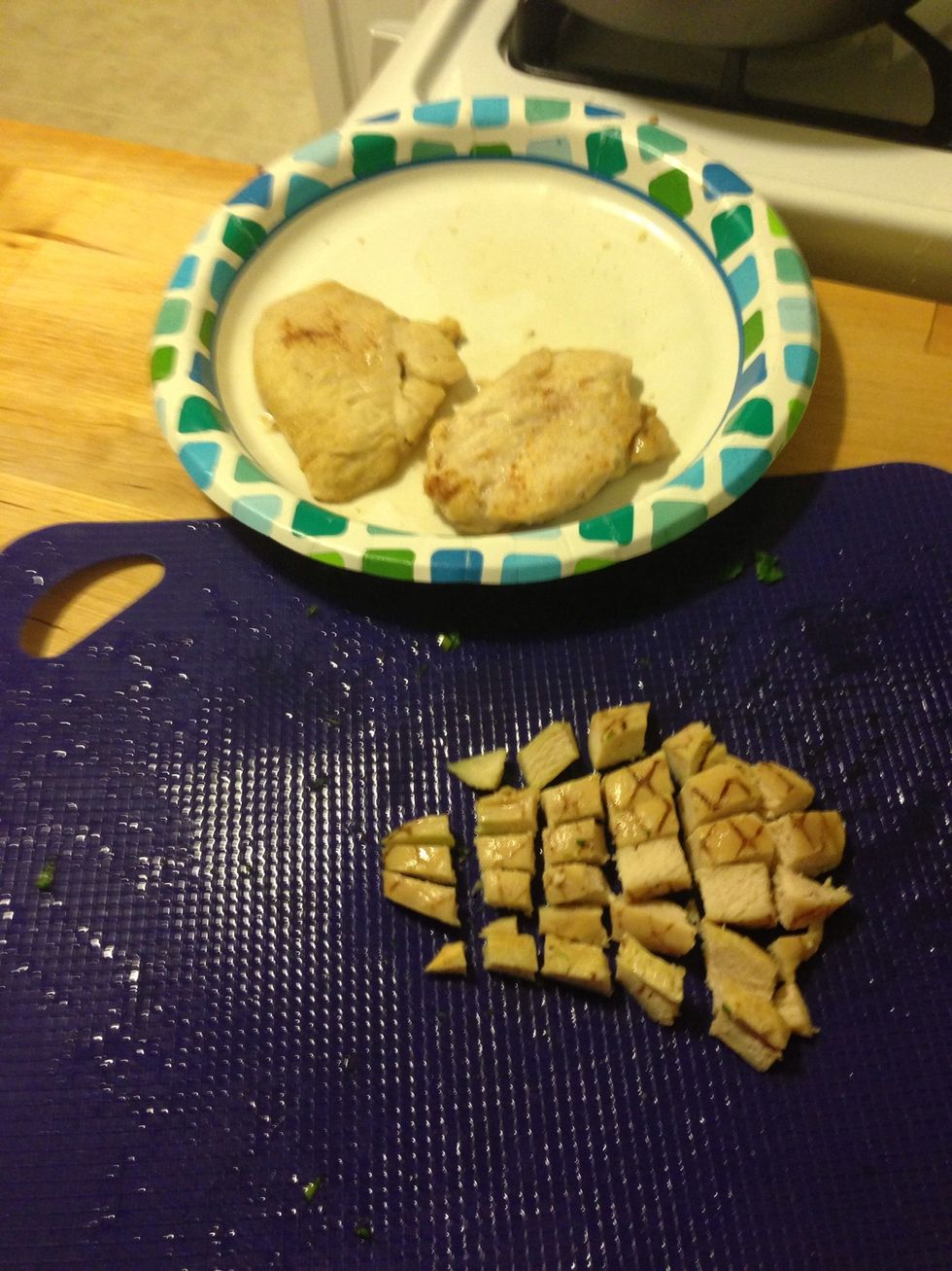 Chop up your four chicken breasts and add to the mixture. I used premade frozen chicken because it is easy to use.