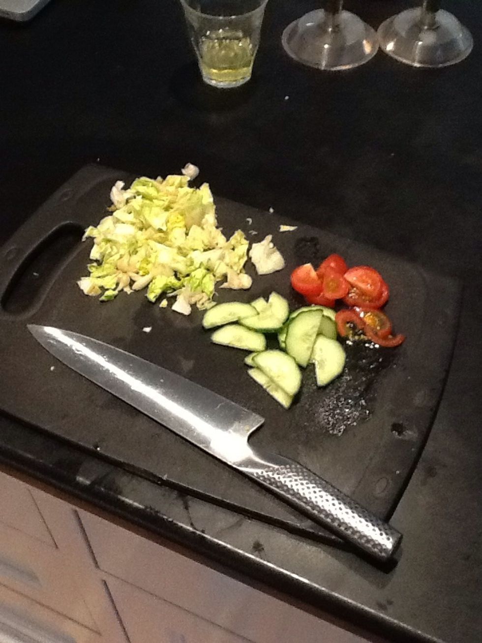 Chop up your lettuce, tomato and cucumber