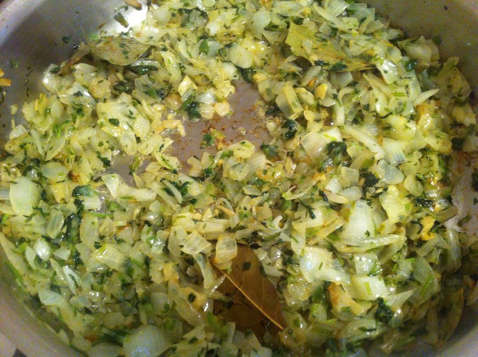Chop up your onions nice and good. Deseed your serranos and chop. Chop up your cilantro, stems and all, set aside a little for garnish. Large pan on Medium High heat. Add oil, butter & chopped things