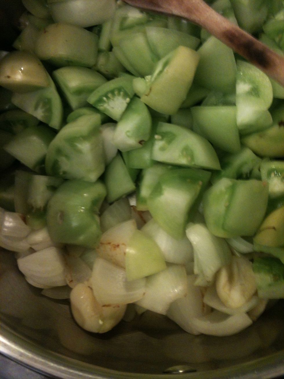 Chop up your tomatoes and add them to the pot. Don't forget to remove the core form the tomatoes Peel your garlic and add that also.