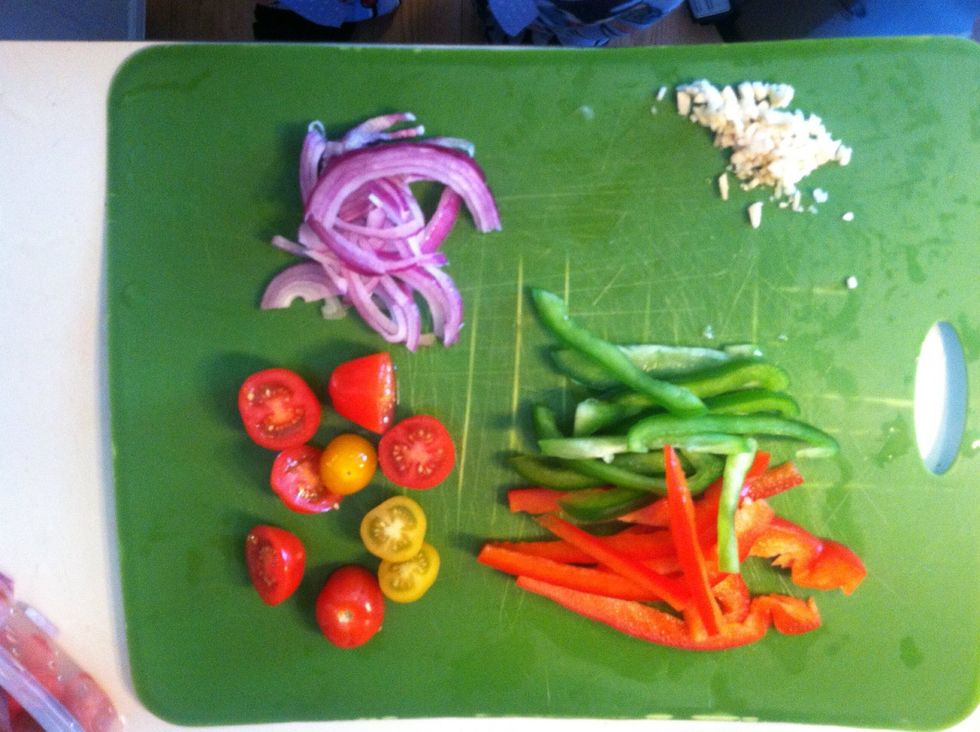 Chop up your veggies and mince your fresh garlic. You can use whatever veggies you have on hand. I used tomatoes, peppers, and half an onion. Be creative!