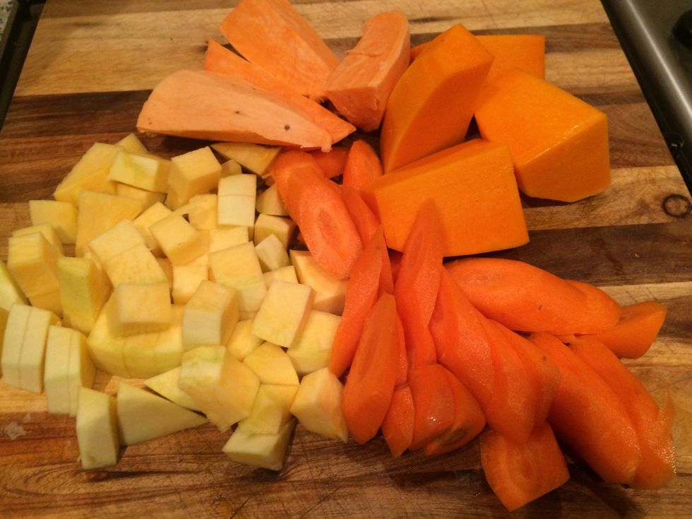 Chop veg, carrots and swede take longer so cut them smaller than sweet potato and butternut squash