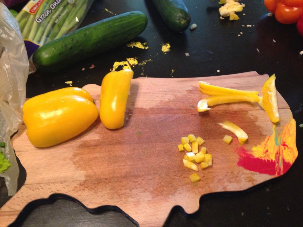 Chop yellow peppers.