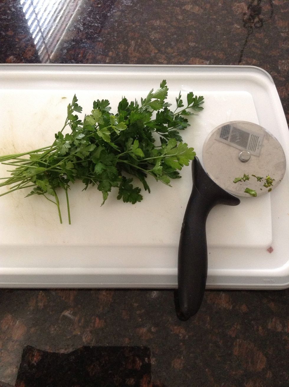 Chop your fresh bunch of parsley. I love using a pizza cutter; makes it fast & easy.