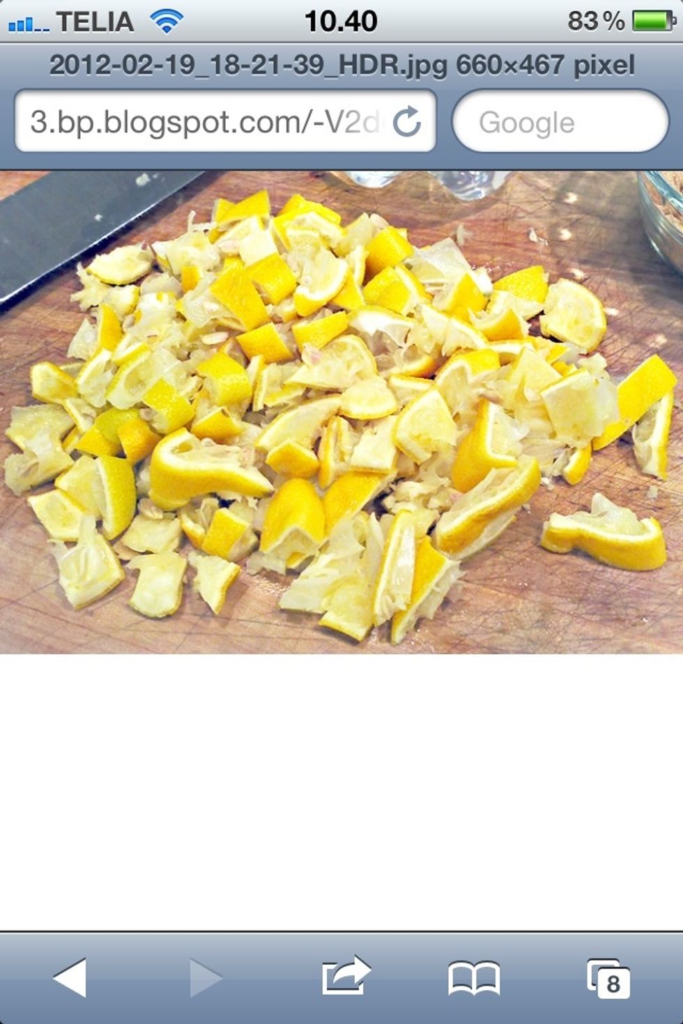Chop your lemon into pieces that will fit into the opening of your bottle. I used some peel and some whole lemon  I did not take a picture of my lemon chopping so I found one on the net.