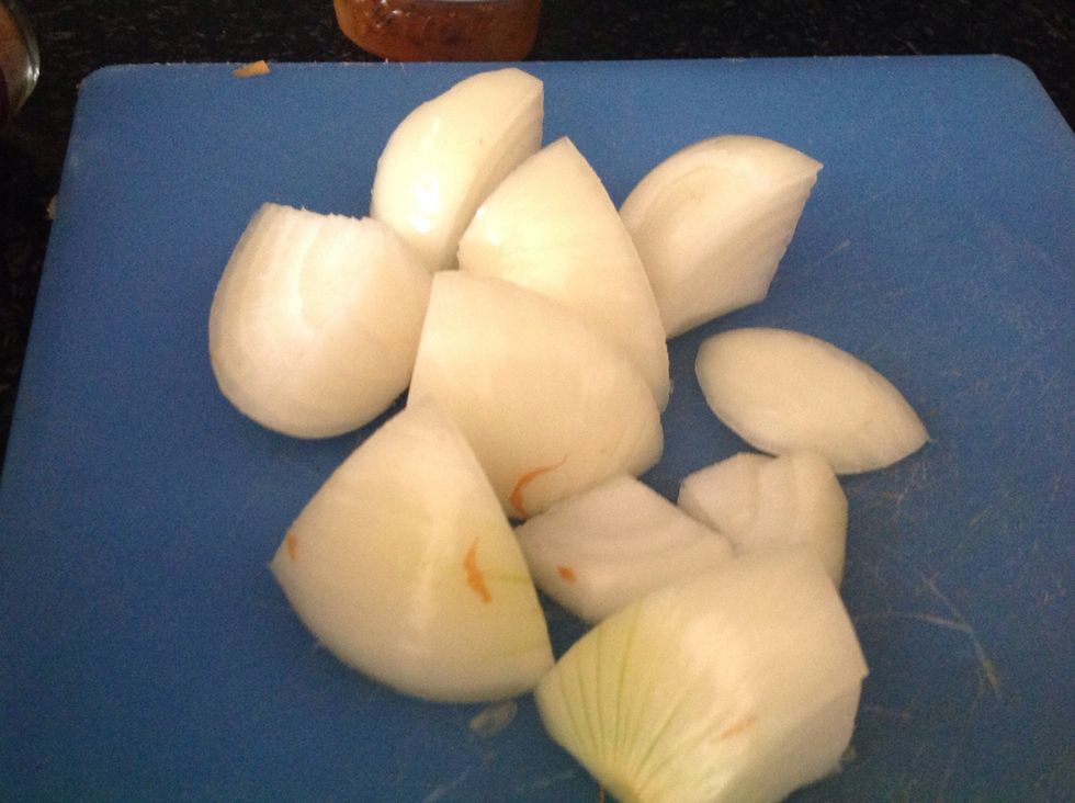 Chop your onion into quarters.