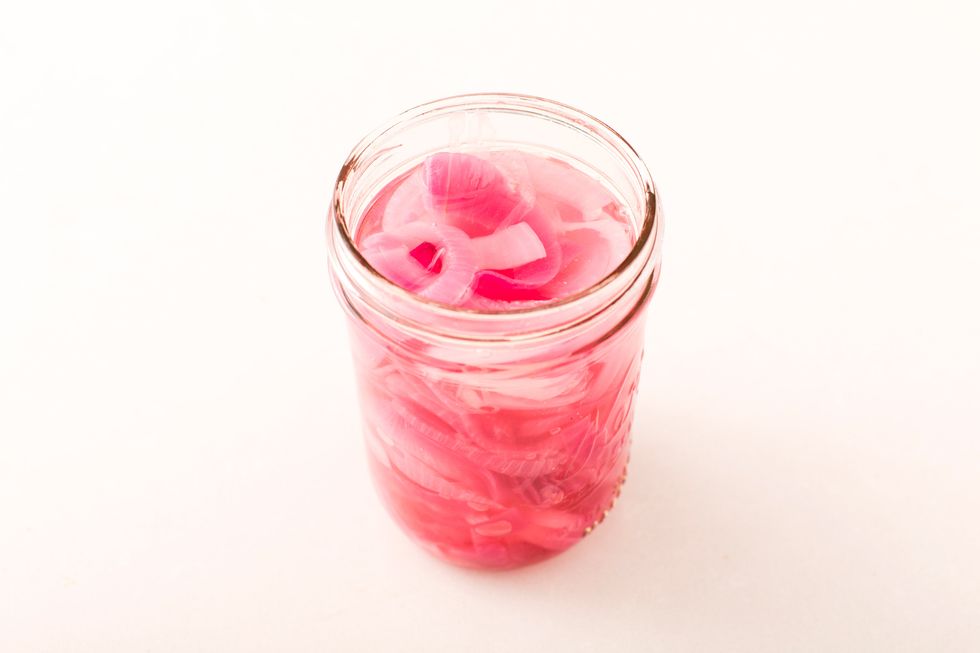 Chop your red onion and add to a jar with vinegar. Let it sit for 20 minutes.