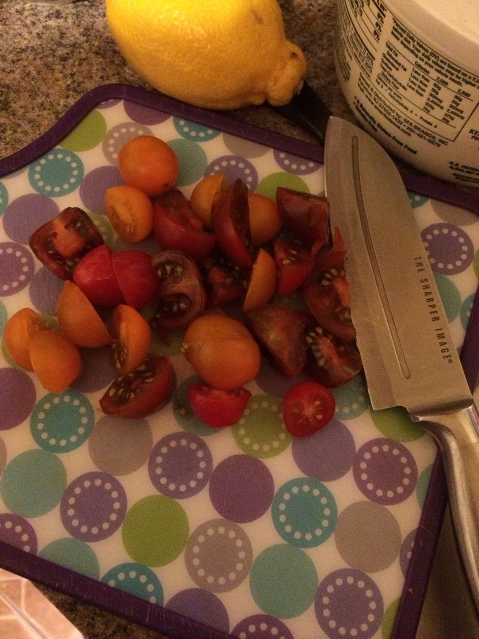 Chop your tomatoes in half, smaller ones you can leave whole.