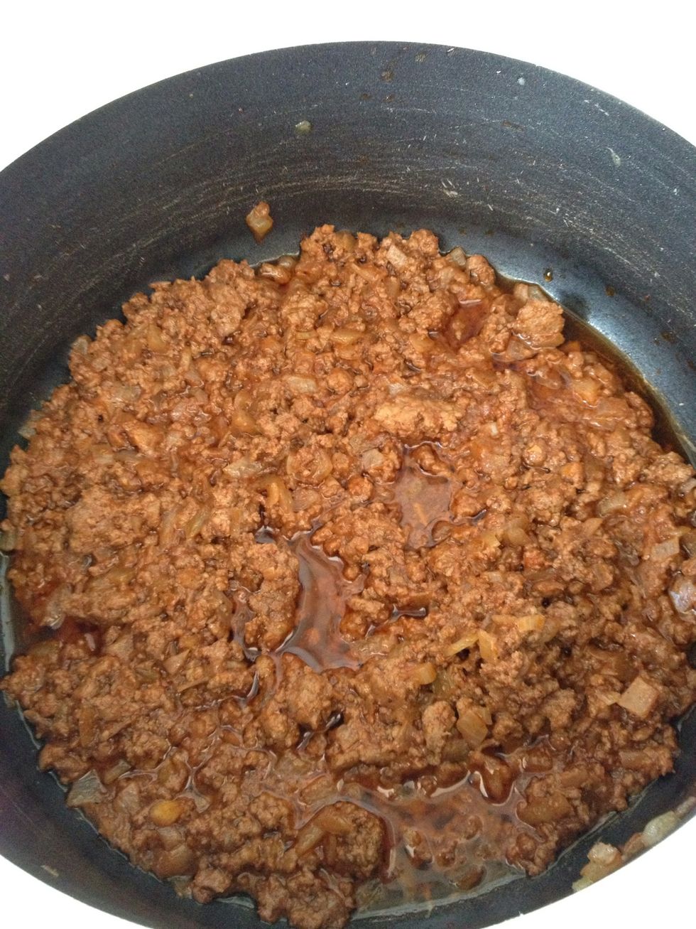 Chopped one small onion cooked until it melt and the add the ground beef and one table spoon of tomato paste add whatever spies u like mainly salt and paper