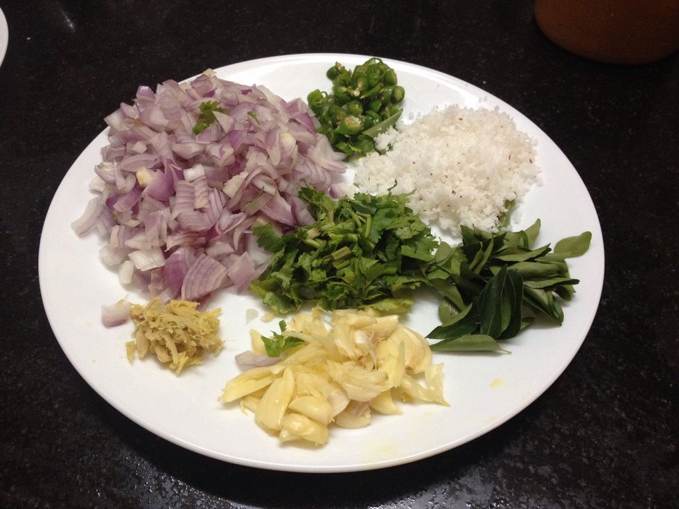 Chopped Onions, Chopping, Coriander leaves,  Crushed Ginger, Crushed Garlic (more quantity), Chopped Green Chilli, Curry leaves, Grated coconut. (Very important)