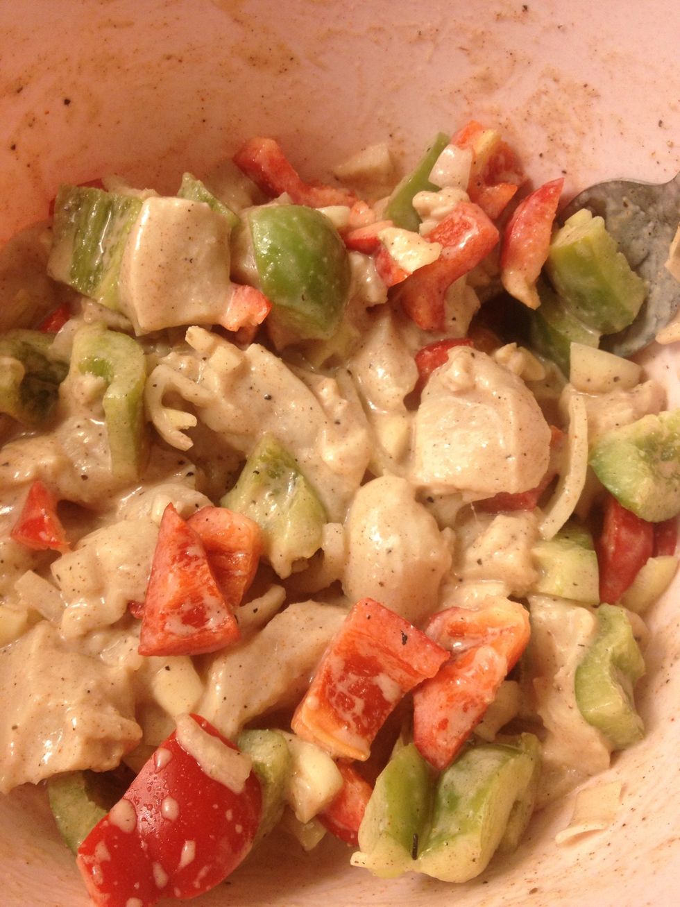 Chopped some green and red pepper ( optional) its good to do this step day before add the yogurt and the spies onion and garlic