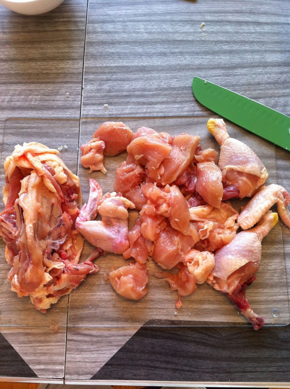 Chopped up chicken + carcass. Don't throw the carcass out! We will use it to add flavour