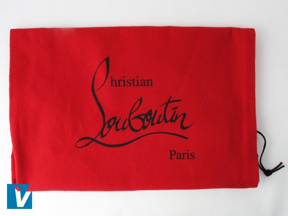 Christian Louboutin heels are accompanied by a red dust cover that features the logo & the word 'Paris' below & to the right. The shade of red & font can vary slightly in some rare cases.
