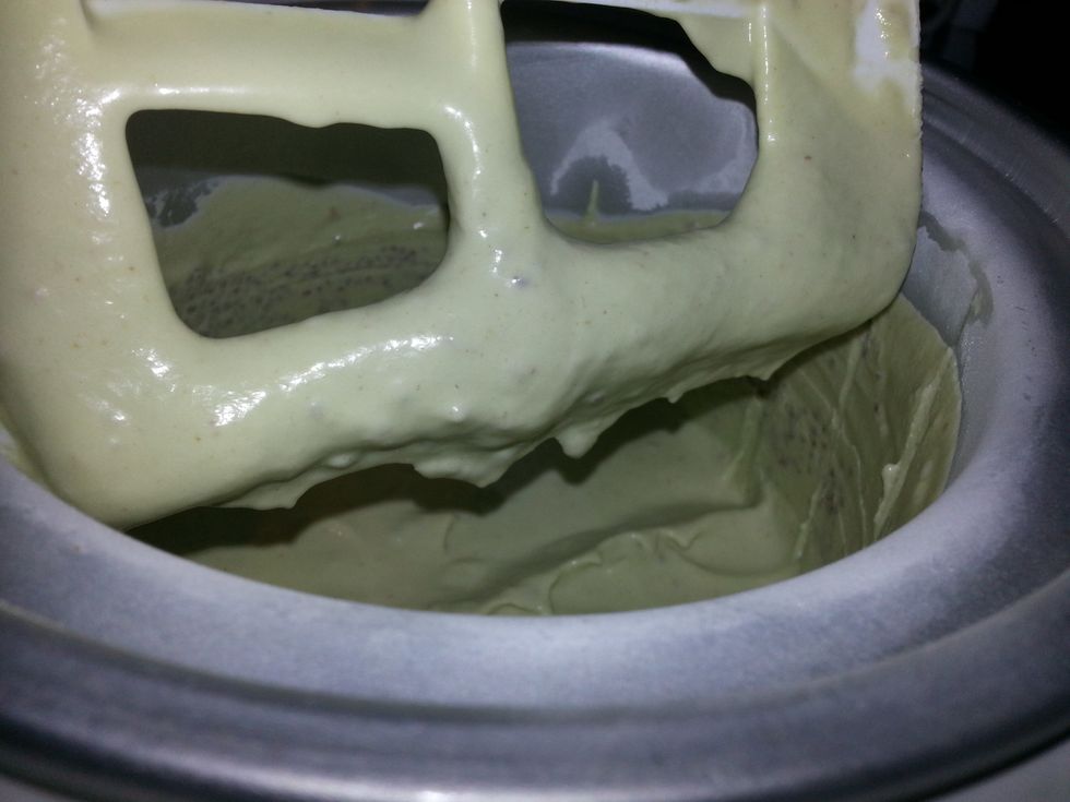 Churn for 3 minutes and then add the soaked chia seeds in liquid. As you can see the sides of the bowl have frozen and the ice cream has thicken.