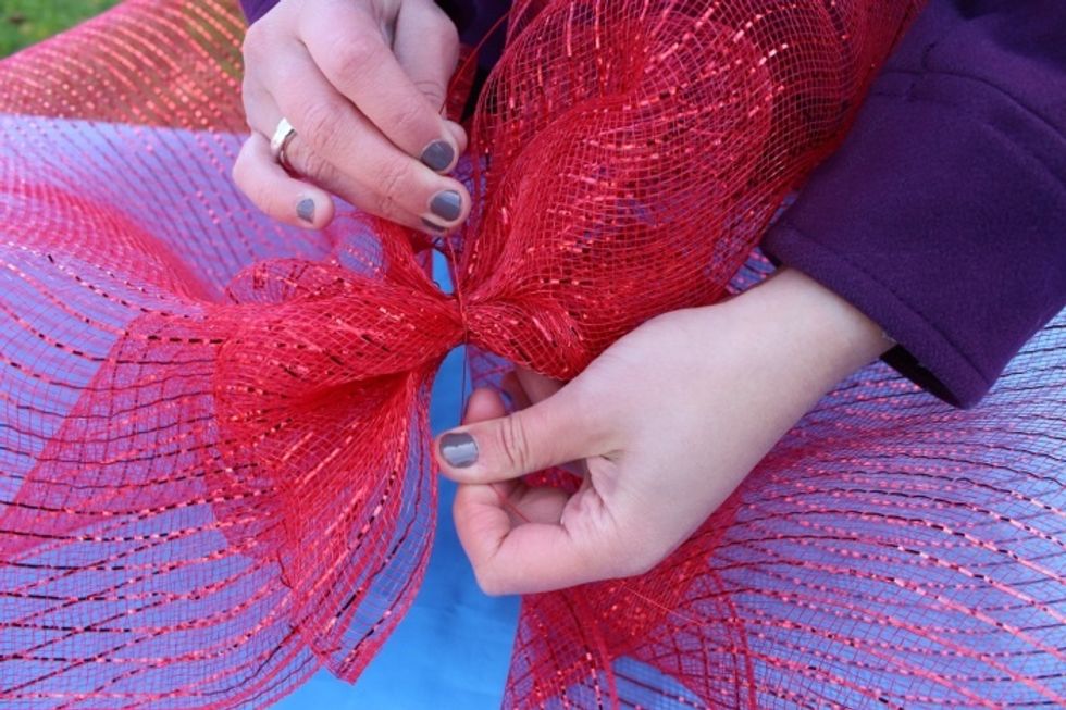 Cinch together where the ribbon is overlapped in the center and secure with wire.