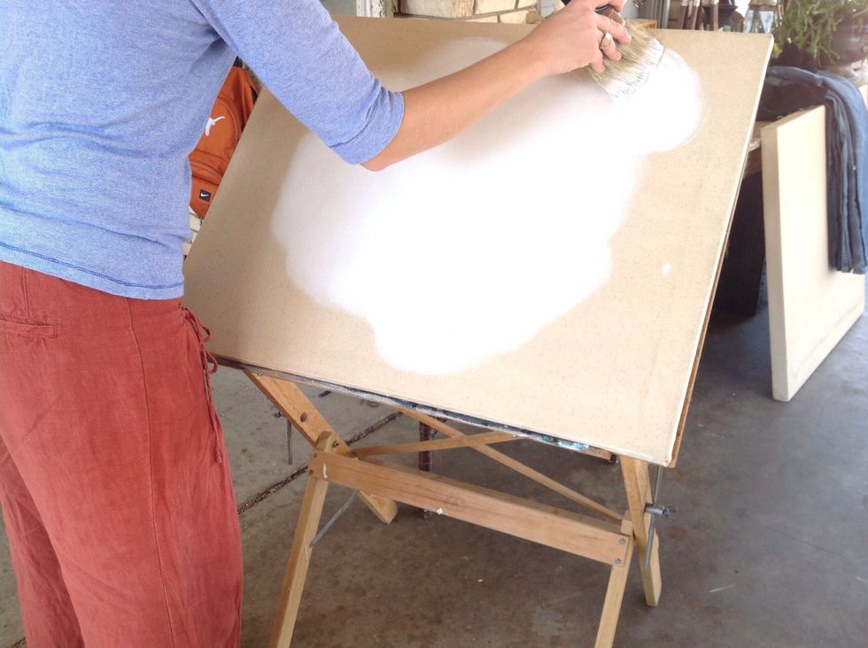 Circular motions help work in the paint while preventing brush strokes.