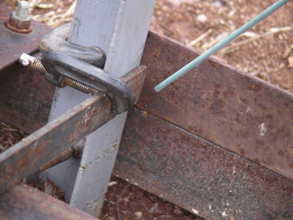 Clamp the pieces to a square jig and weld it together. You can grind the welds to make it look prettier, then paint the holder with a metal primer.