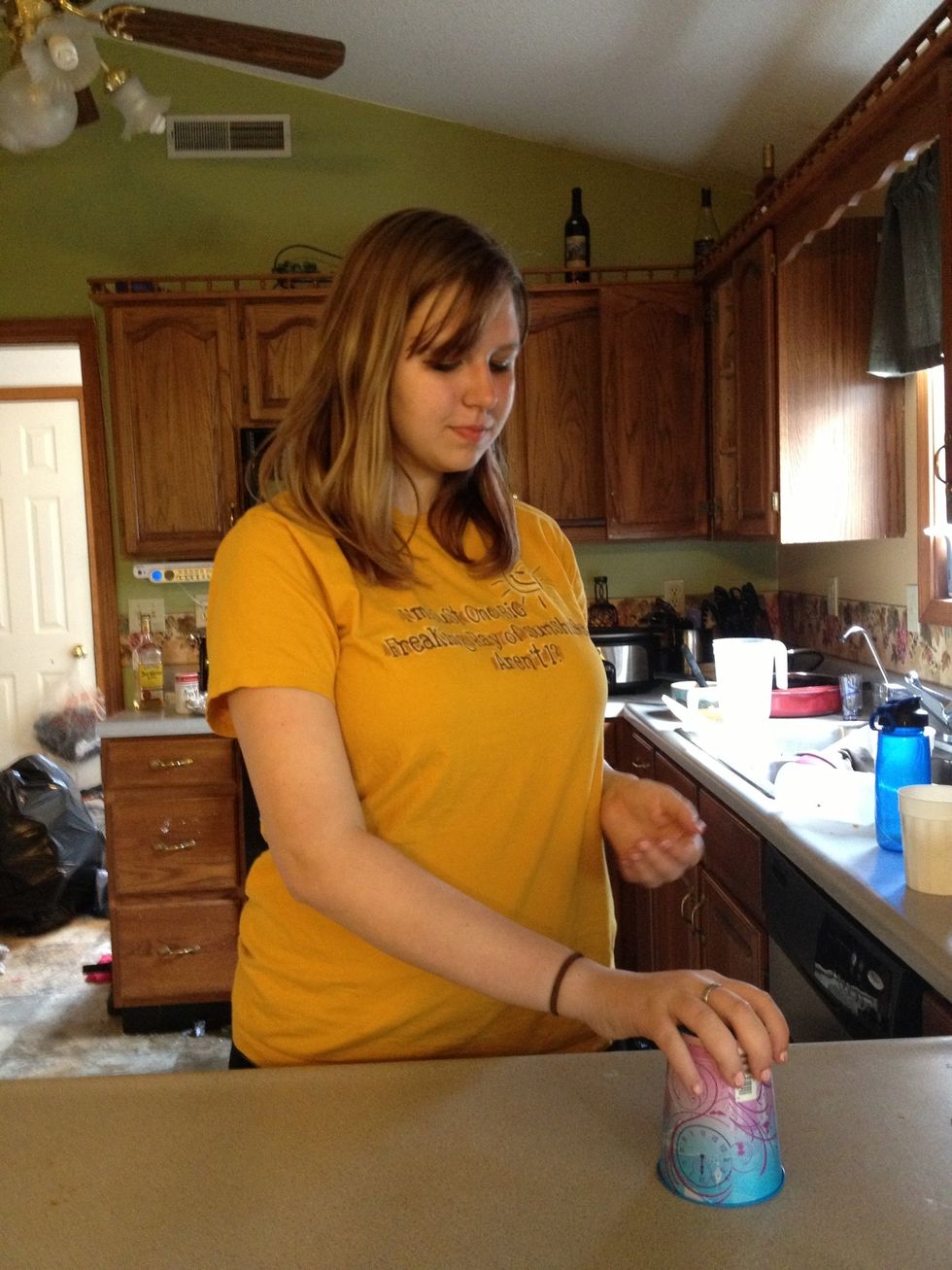 Clap once, pick it up and set it down a few inches away, hard enough to make the noise you need.