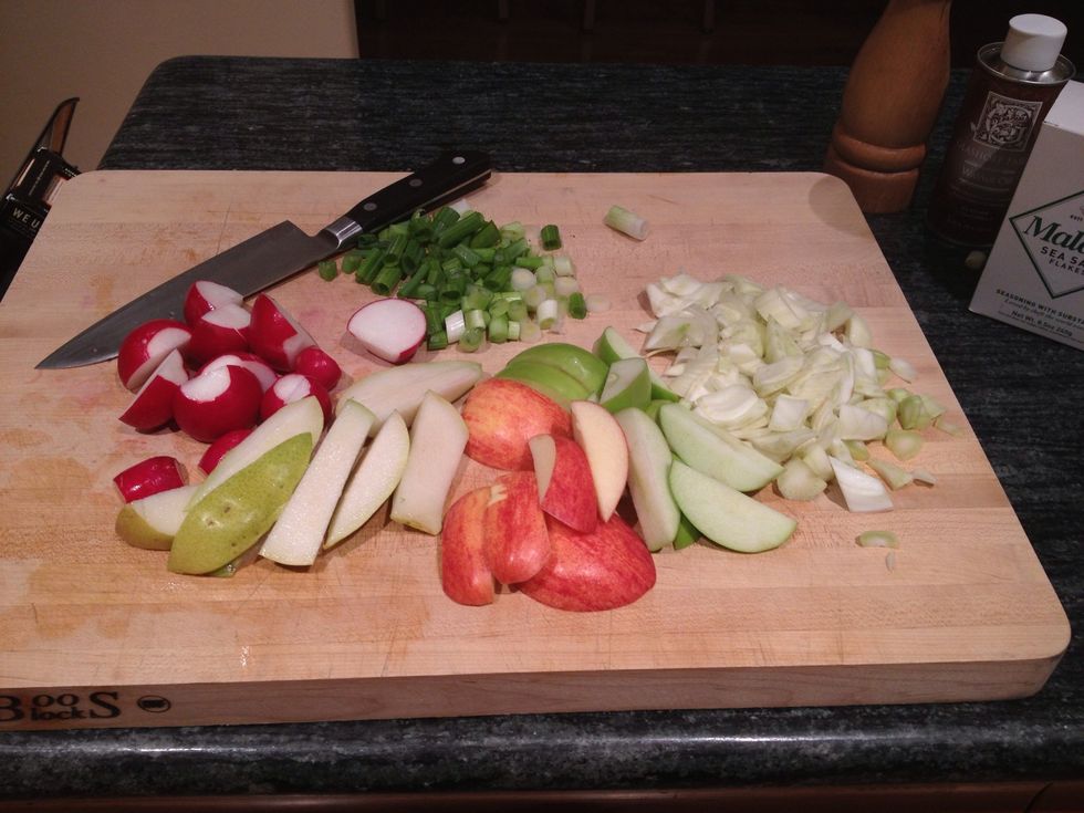 Clean and chop the apples, fennel, pear, scallions and radishes.