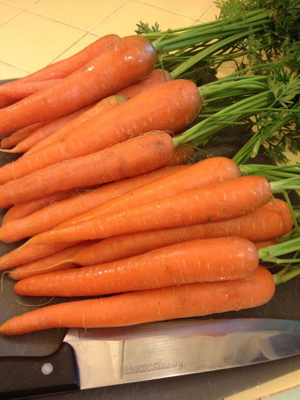 Clean and coarsely chop organic, locally grown carrots.