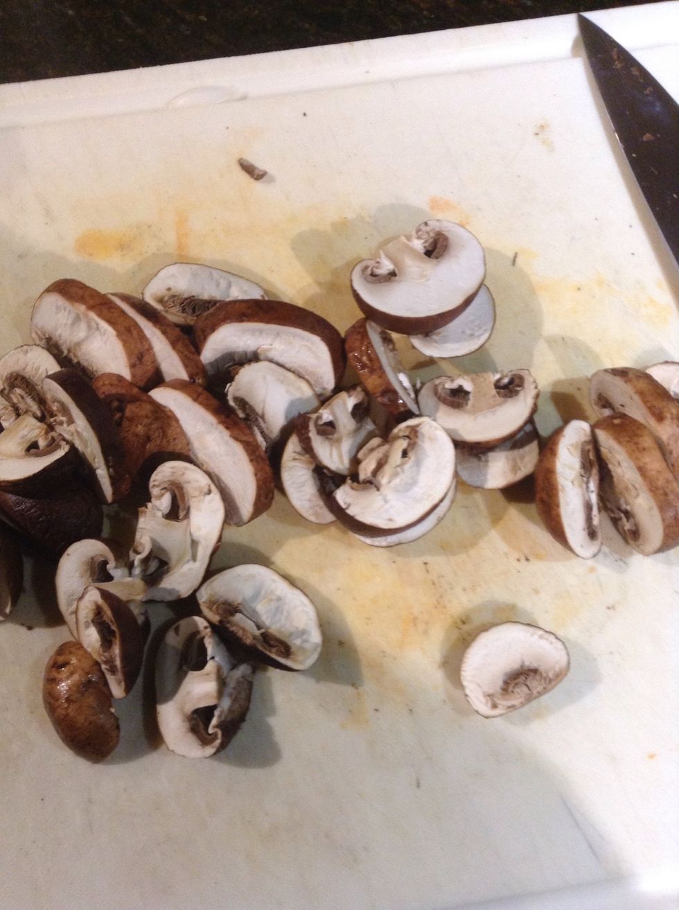 Clean and thickly slice mushrooms