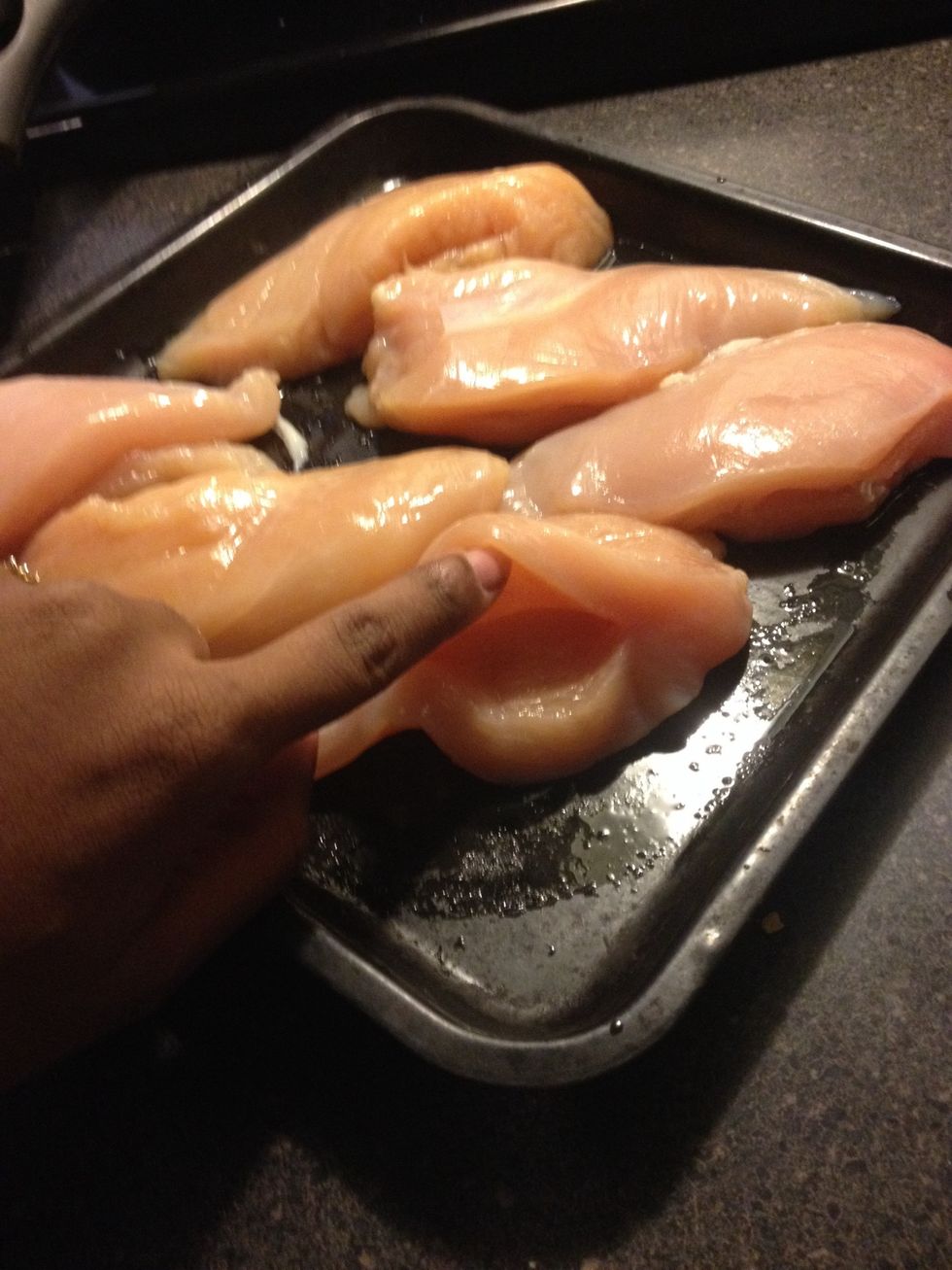 Clean breasts and make a slit for the stuffing