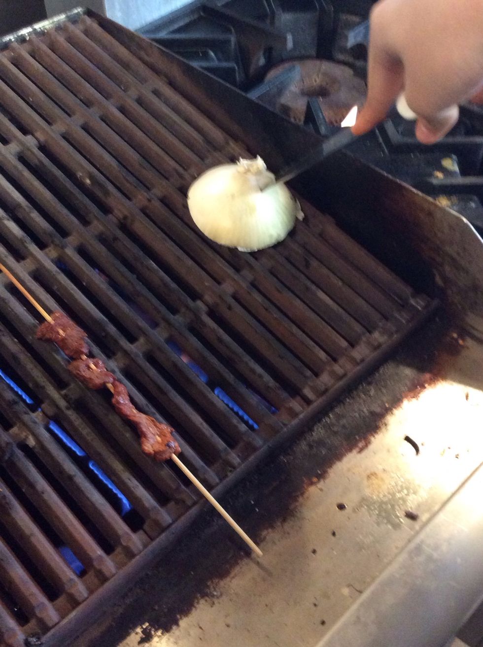 Clean grill with onion